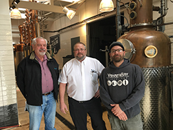 Yahara Bay Distiller owners with All Comfort Services Master Plumber Gary Kunkel