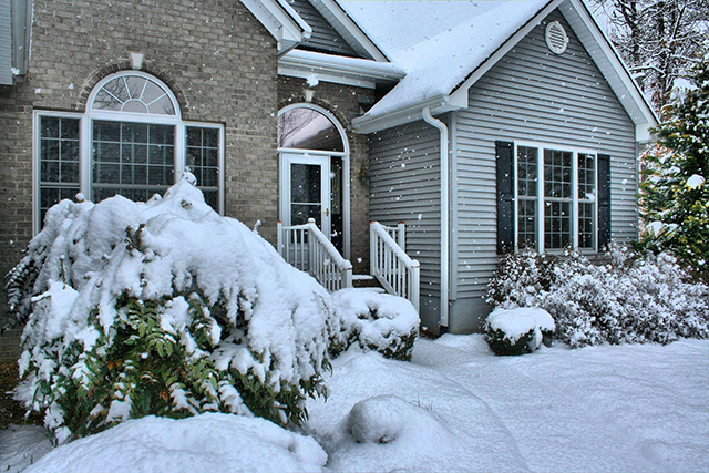 Exterior of American home with a fresh snowfall