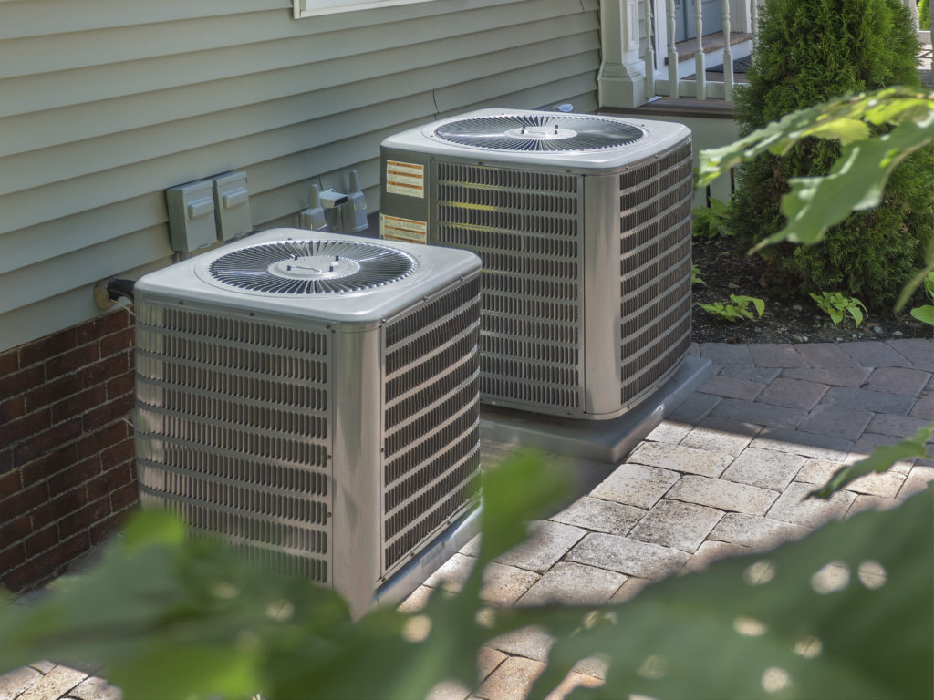 Two new HVAC systems installed outside of a home in Wisconsin. 